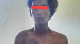 AS, seorang pria yang berprofesi sebagai nelayan yang diduga melakukan tindak kekerasan terhadap anak dibawah umur 
