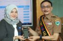 Bupati Pesisir Selatan Hendrajoni bersama Kepala Bank Nagari Cabang Painan Rahmadani saat peluncuran e-Rissa