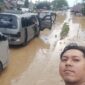 Perjalanan Syamsul Bahri Ys kembali ke desanya berubah menjadi kisah kemanusiaan di tengah banjir di Aceh Ⓒ Hak cipta foto di atas dikembalikan kepada pemilik foto